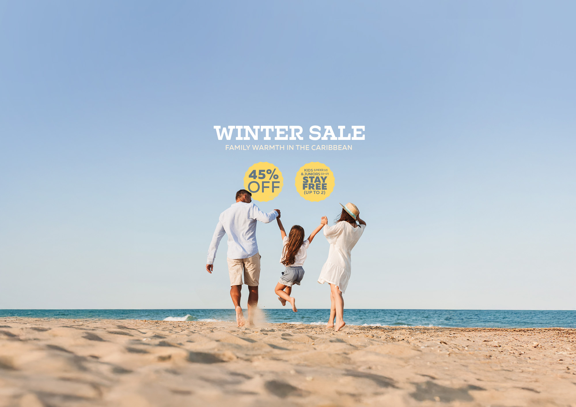 Family playing at the beach