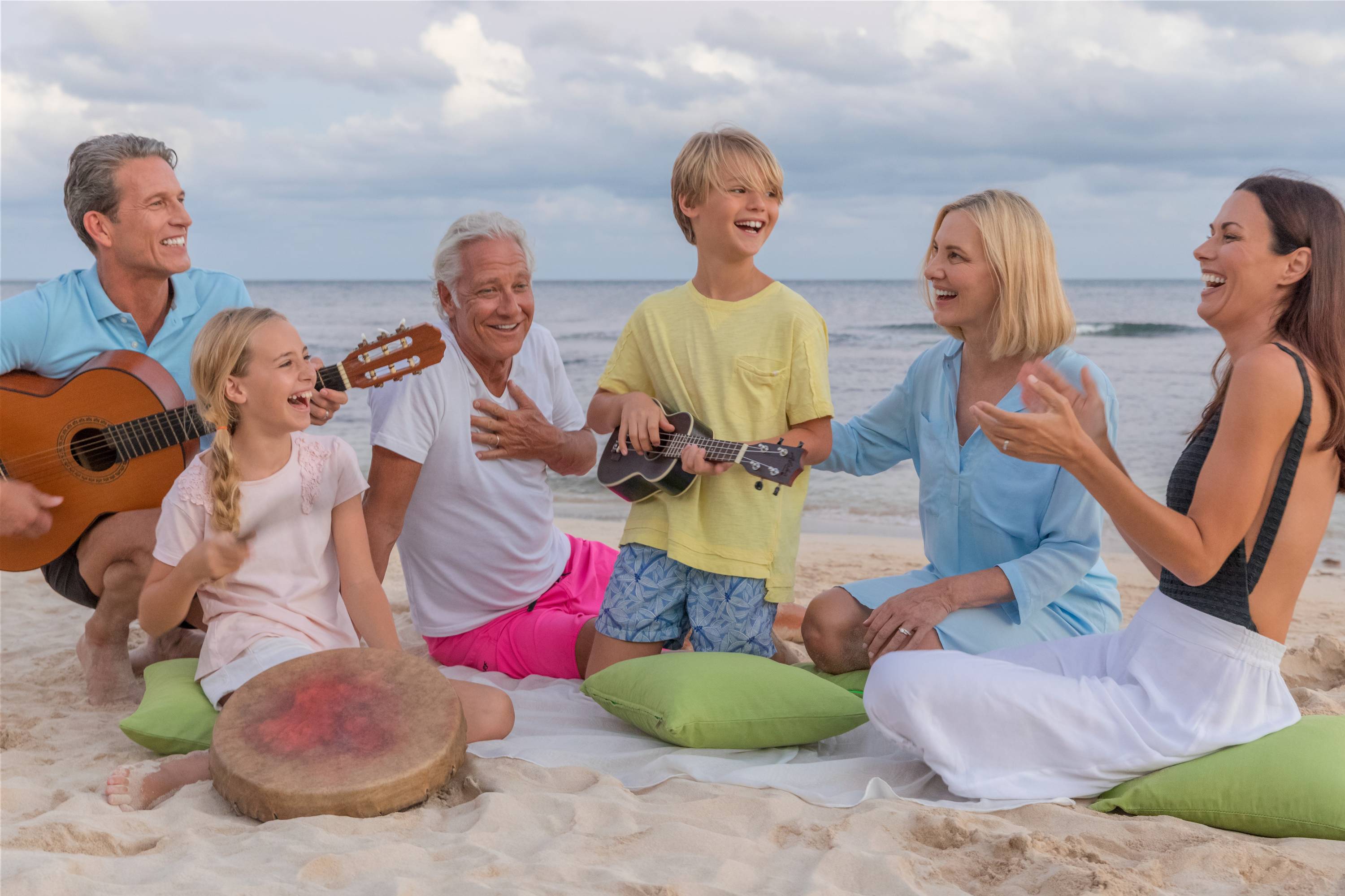 Family playing at the beach
