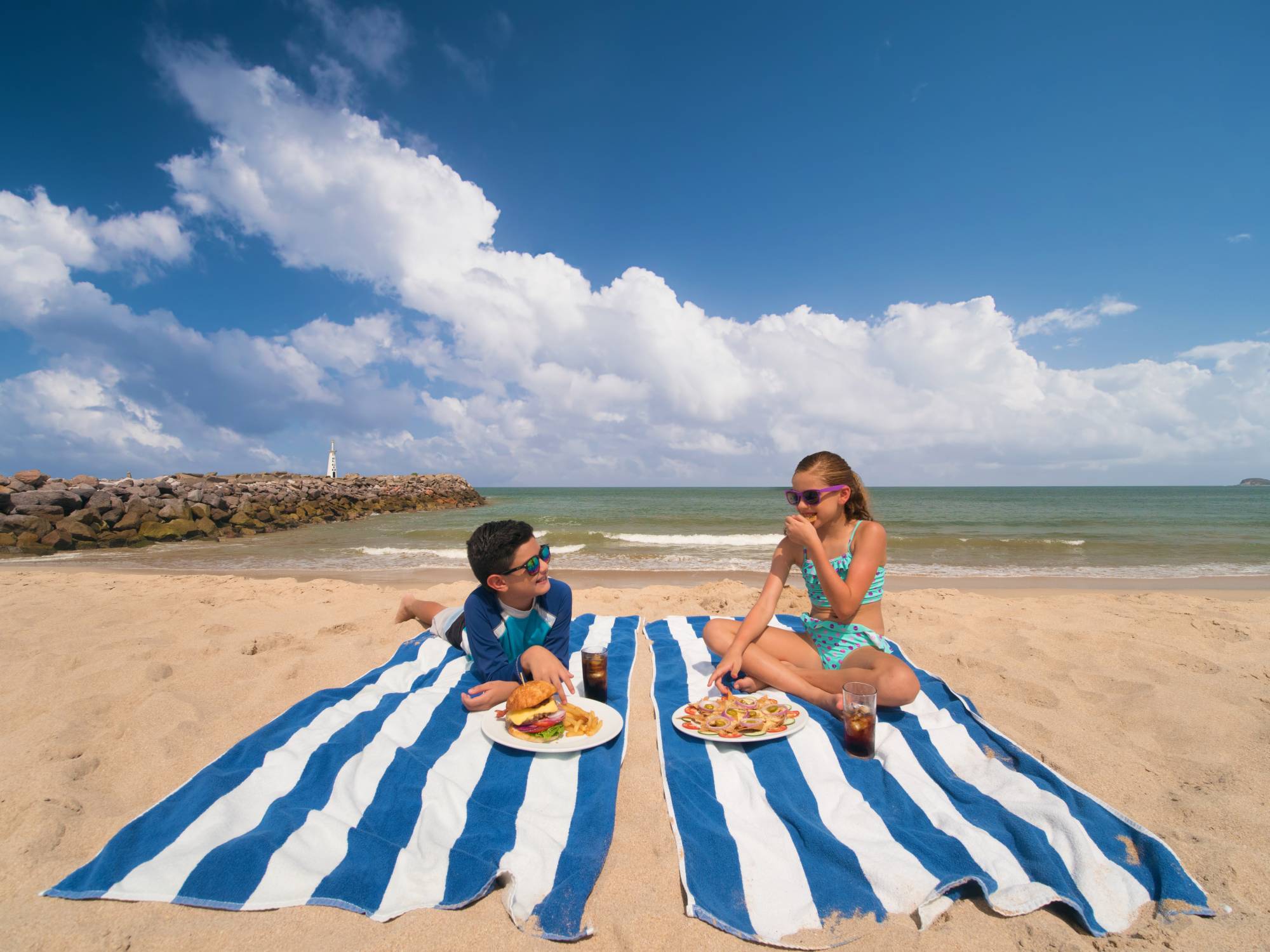 Family eating at the beach